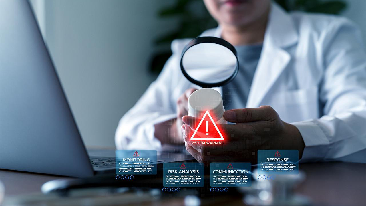 Researcher carrying lab equipment